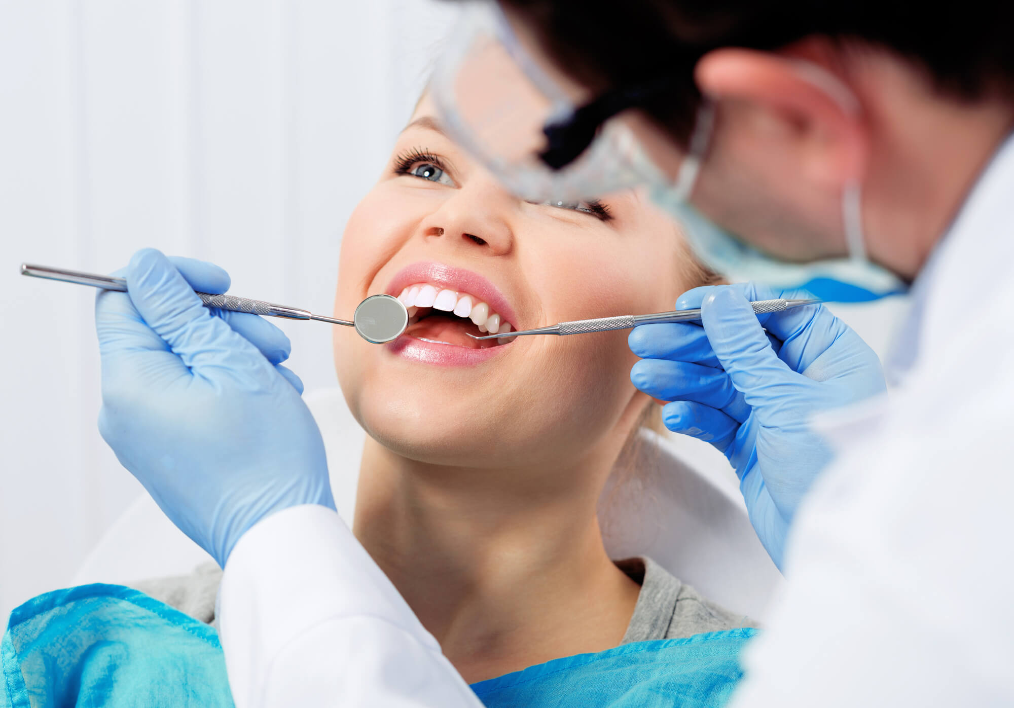 65389271c7175b8ee63bc7a6 Dentist in Cherry Hills at work